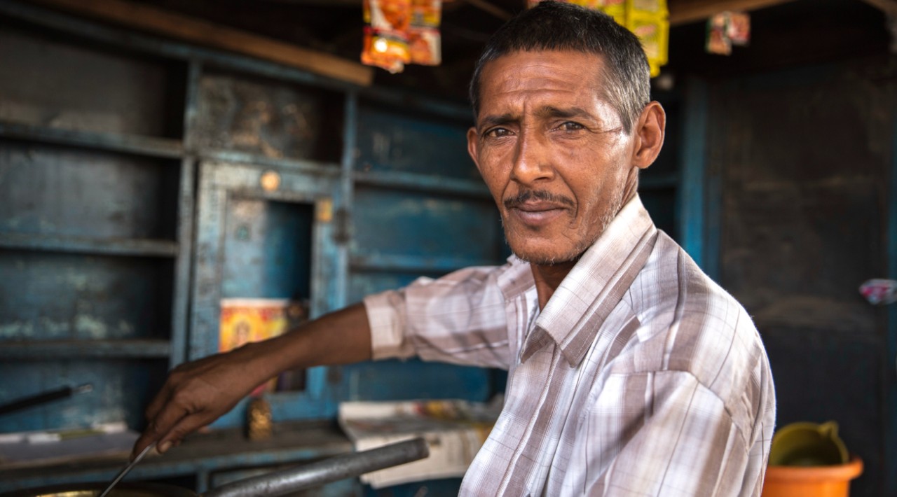 A photo of a small business owner in India in his workshop.